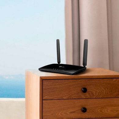 Роутер TP-Link TL-MR150 &mdash; 3G/4G роутер 802.11n 2.4 ГГц 1xWAN 3xLAN Fast Ethernet 729955 фото